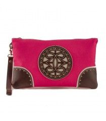 Bolso de mano de tela con adornos en piel.