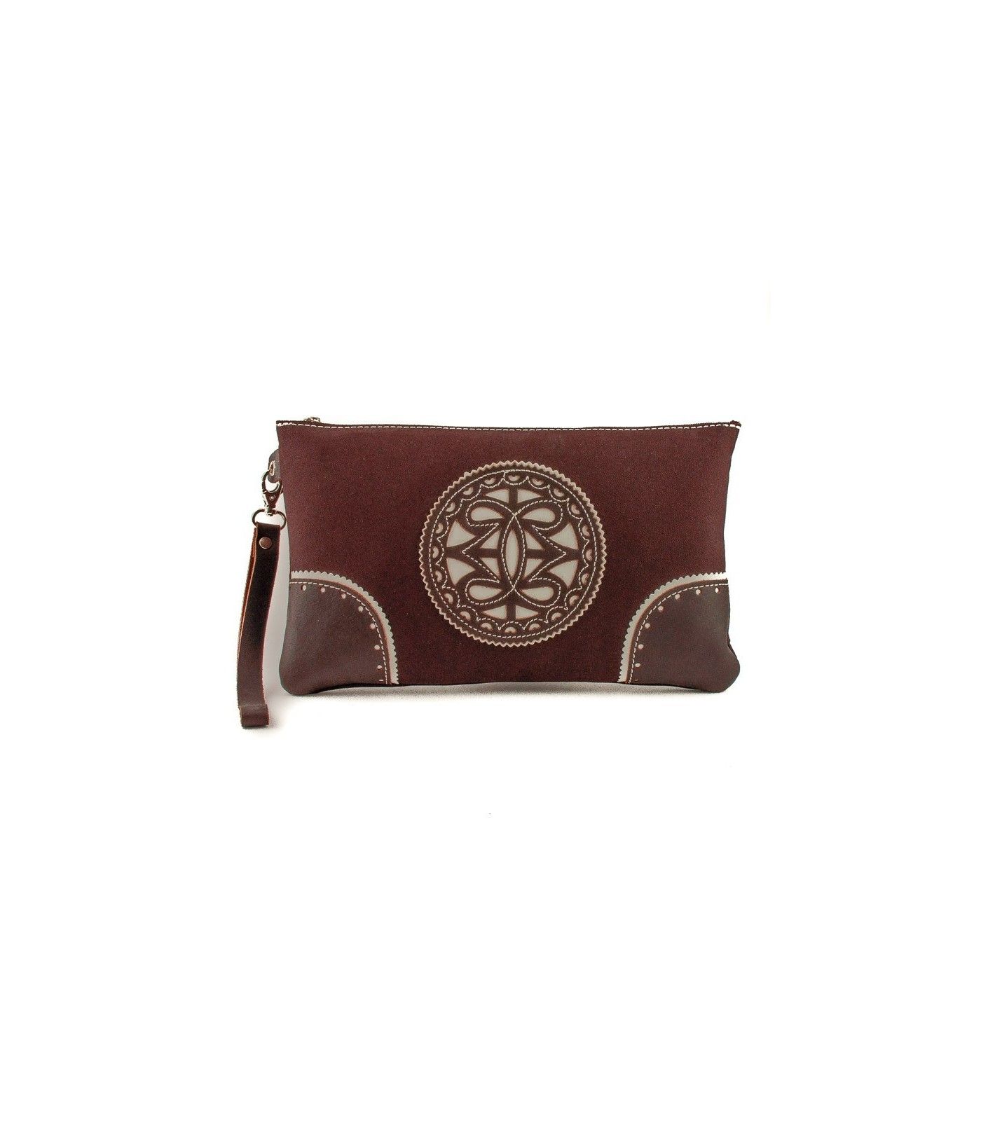 Bolso de mano de tela con adornos en piel.