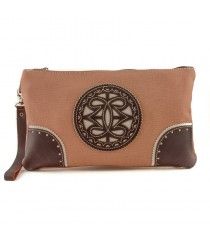 Bolso de mano de tela con adornos en piel.