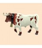 Toro manso cabestro marrón y blanco
