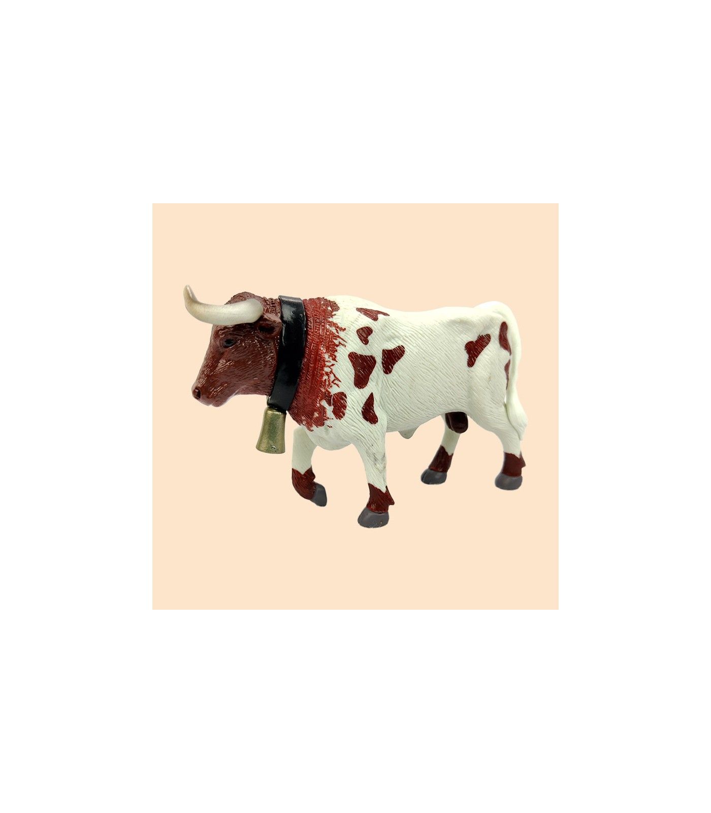 Toro manso cabestro marrón y blanco