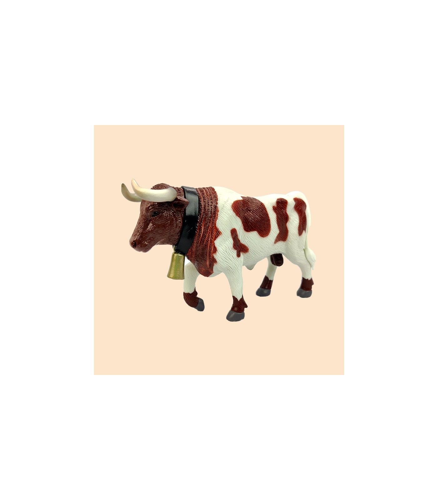 Toro manso cabestro marrón y blanco