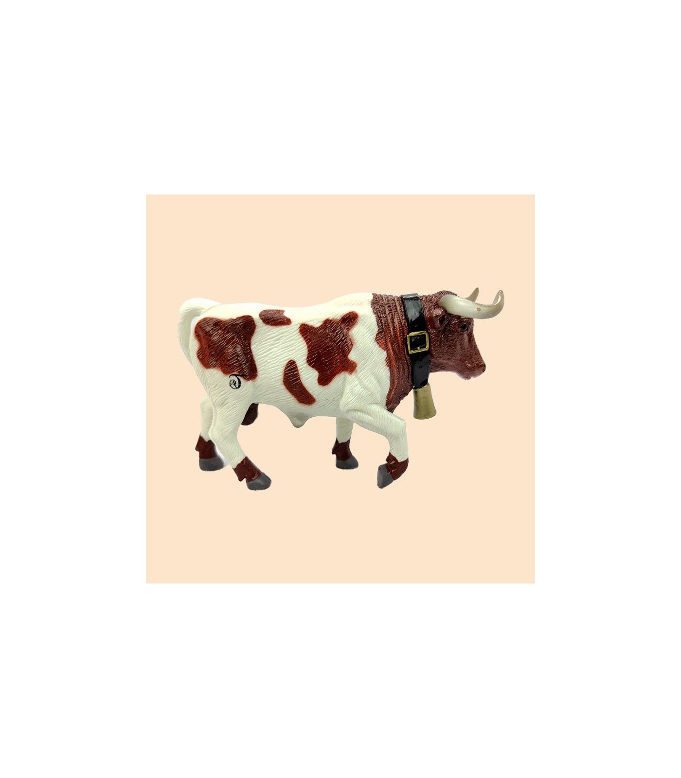 Toro manso cabestro marrón y blanco