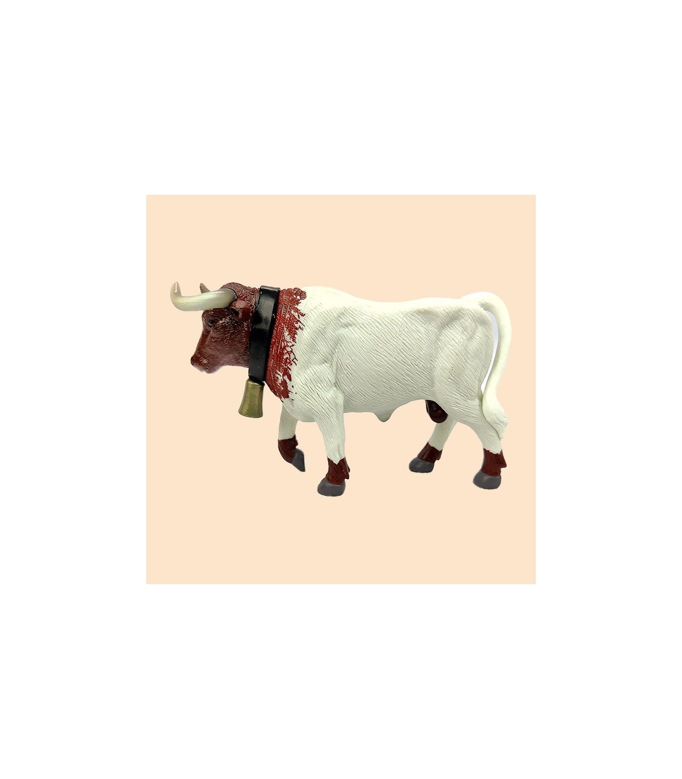 Toro manso cabestro marrón y blanco