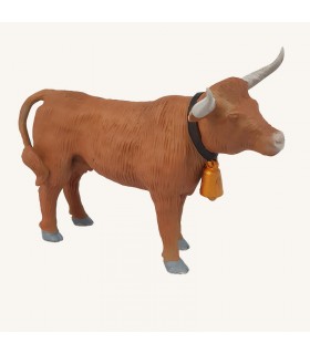 Génisse avec cloche de vache brune